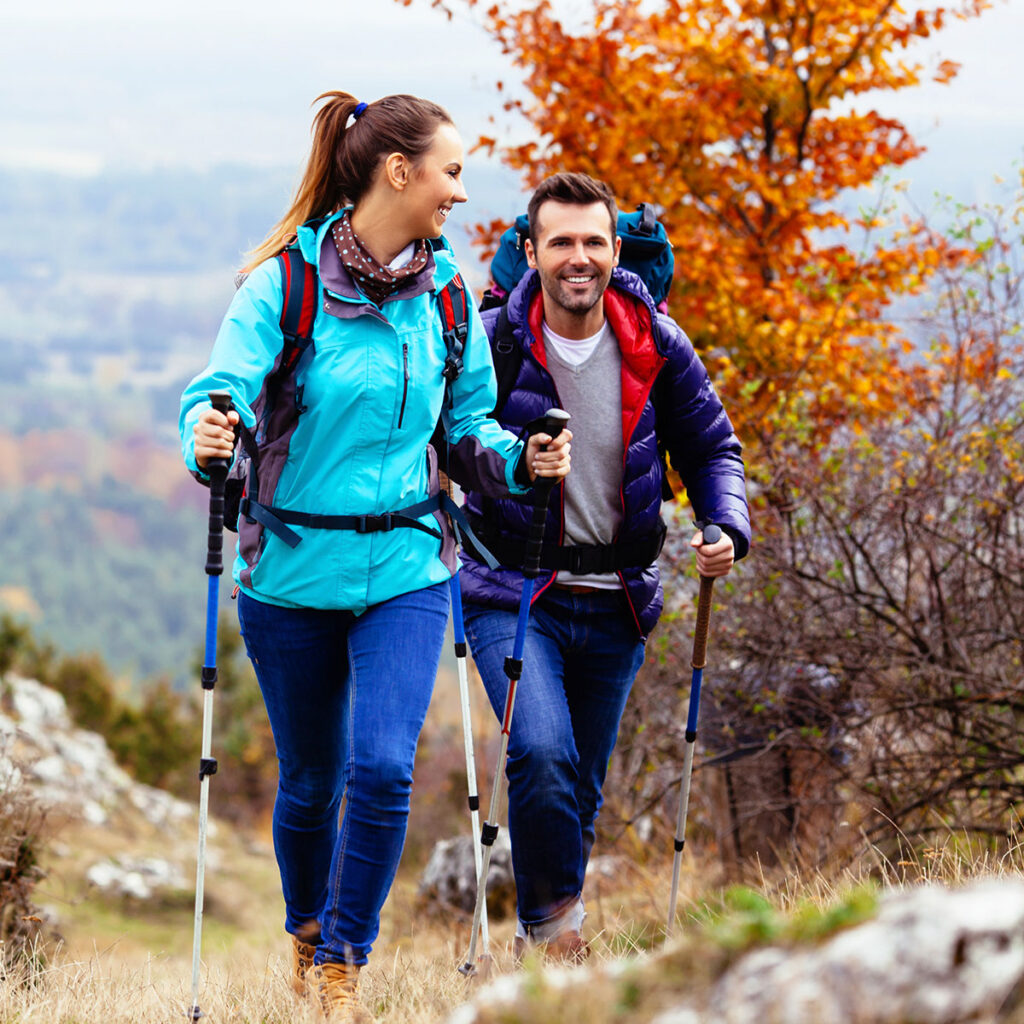 Two people hiking in the fall