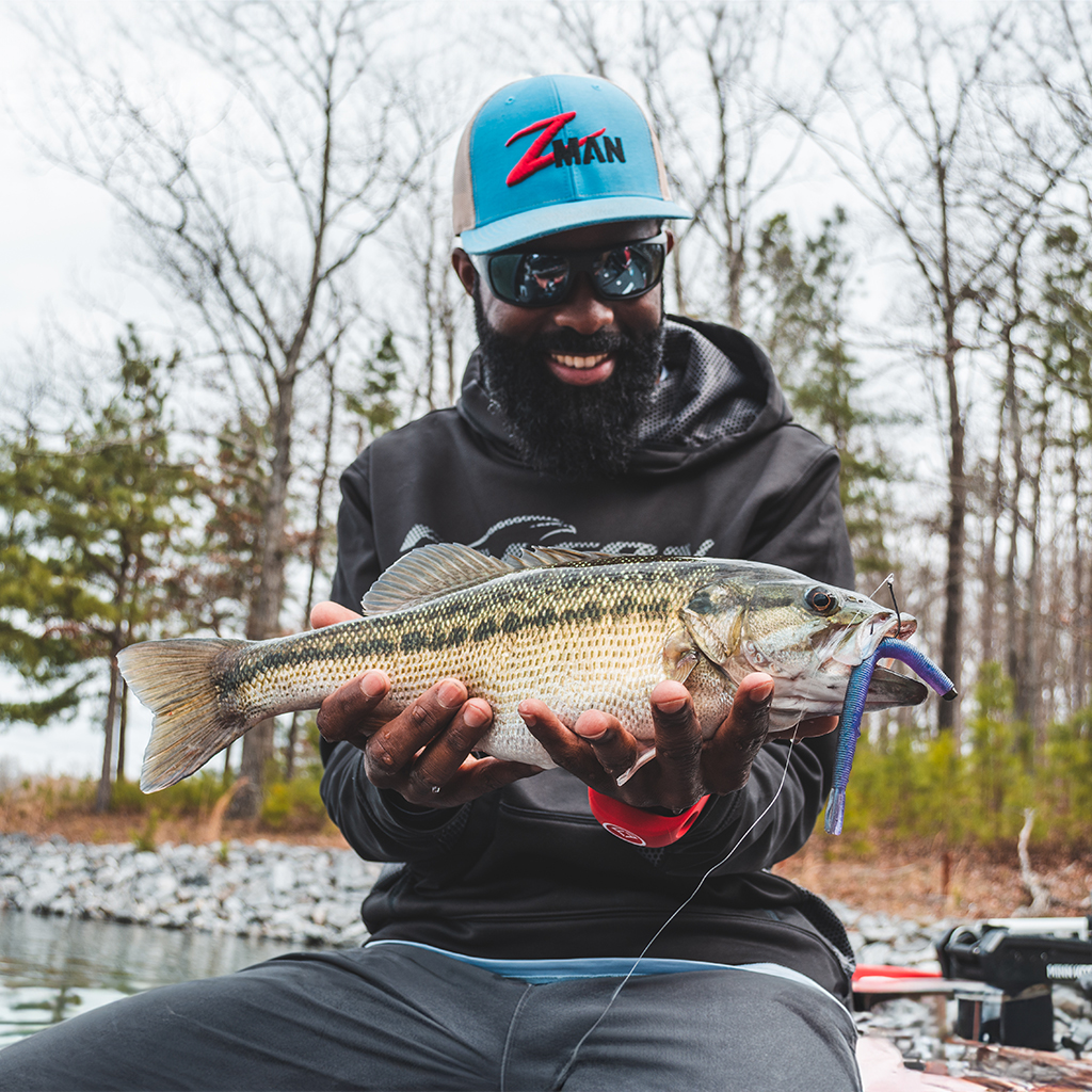 A man admires the fish he caught