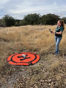Wildlife Biologist Deanne Pfeffer launches drone with thermal camera at Kerr WMA TPWD photo