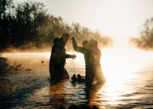 Waterfowl hunters set up duck decoys in a North Carolina wetland