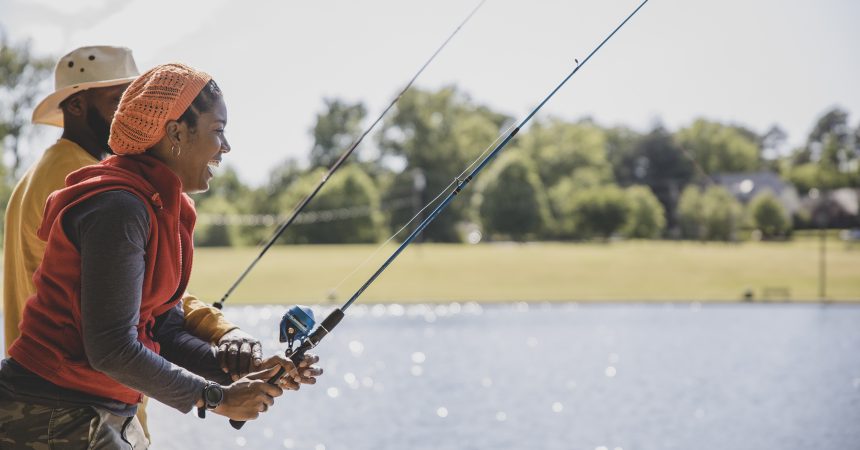 Two people fishing from shore